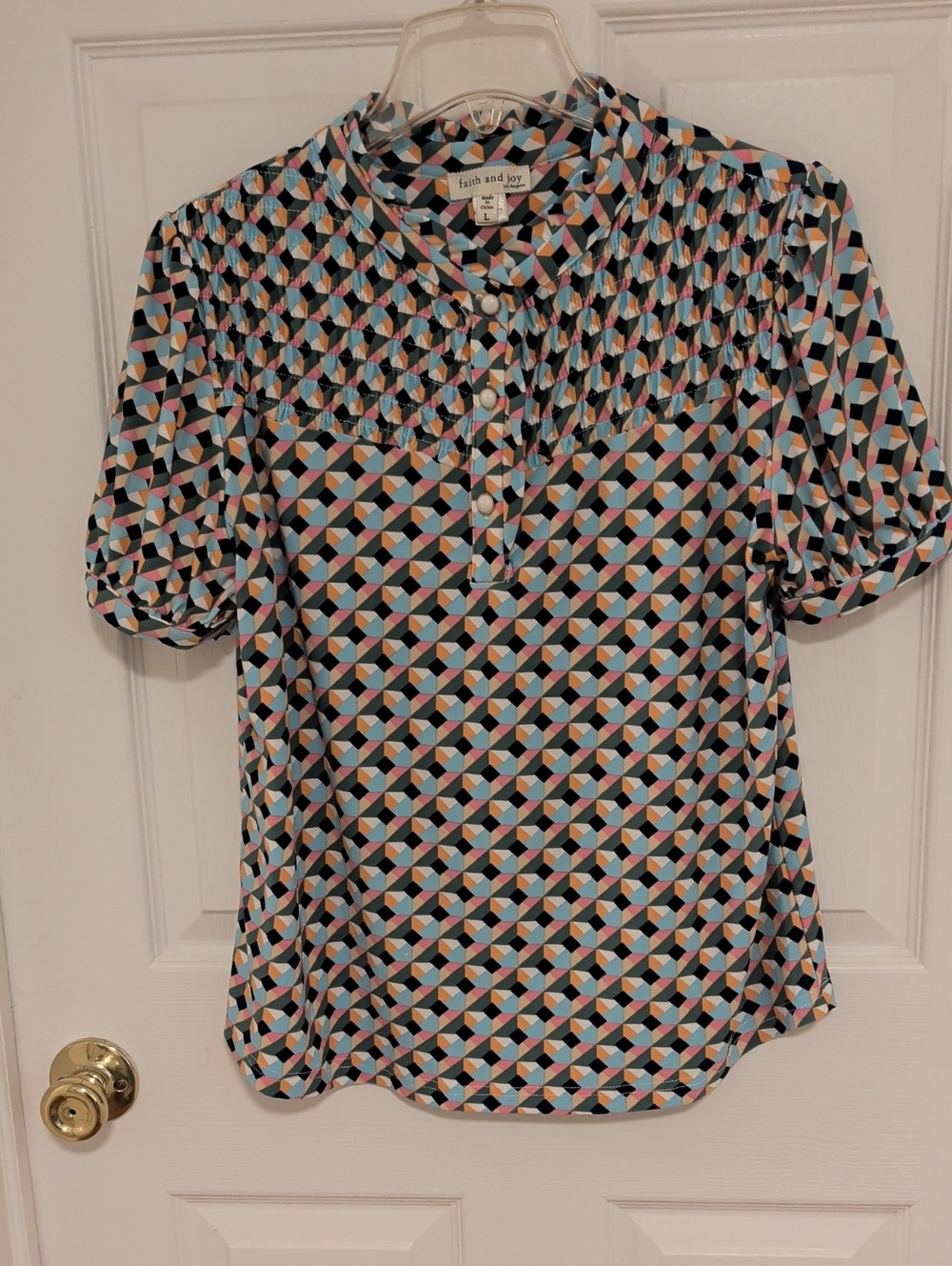 Faith and Joy Geometric Short Puff-Sleeve Blouse in Black with Pastels